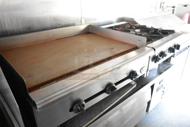 Brand new mobile food trailer kitchen with Wells range, flat top grill, Pitco fryer, in excellent condition.