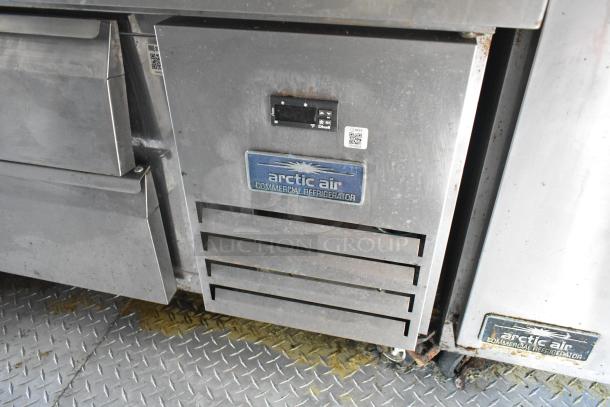 Arctic Air commercial refrigerator in new food trailer, featuring digital controls and durable stainless steel finish.