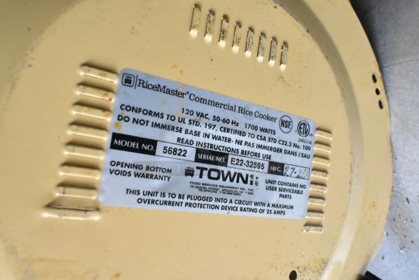 Label of RiceMaster commercial rice cooker, model 56822, 120VAC, 1700 watts, with specific safety instructions.