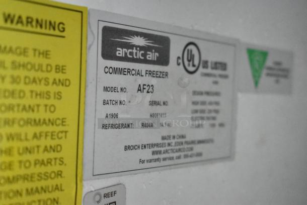 Arctic Air commercial freezer label showing model AF23, batch A1906, and refrigerant R404A, UL listed.