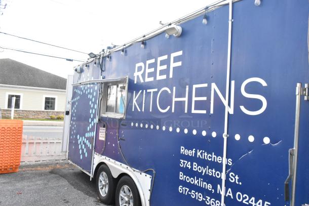 Blue food trailer "REEF KITCHENS", fully equipped with Arctic Air coolers, Wells range, Pyrochem hood, visible signage.