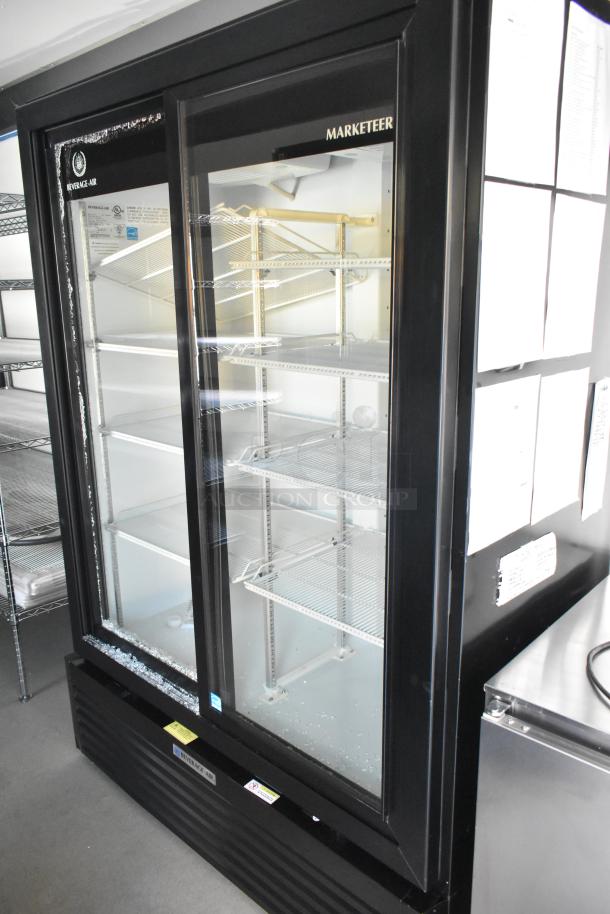 Beverage Air reach-in cooler in a new food trailer, featuring commercial-grade shelving and marketeer signage.