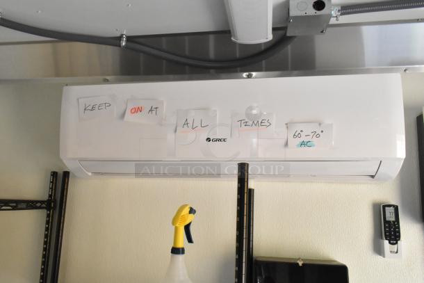 Gree air curtain in new food trailer; notes indicate constant operation, temp 60-70°F. Remote included.