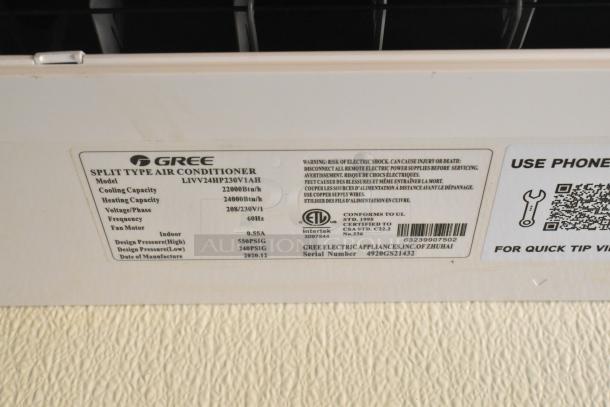 Label on a Gree Split Type Air Conditioner, model LIVV24HP230V1AH, detailing cooling and heating capacity, voltage, and manufacturing date.