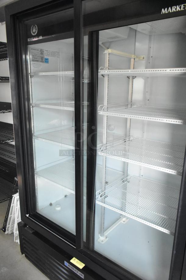 Unbranded food trailer with Beverage Air cooler, glass doors, adjustable shelves, and commercial-grade fixtures; mint condition.