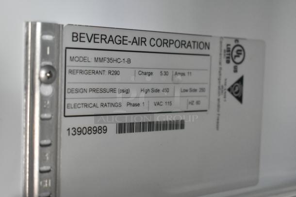 Label close-up of Beverage-Air Corporation cooler model MMF35HC-1-B. Details: refrigerant R290, design pressure, electrical ratings.