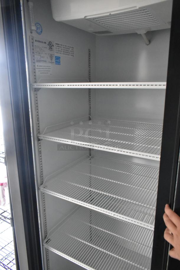 Beverage Air commercial reach-in cooler with label, featuring multiple wire shelves, ideal for a mobile kitchen setup.