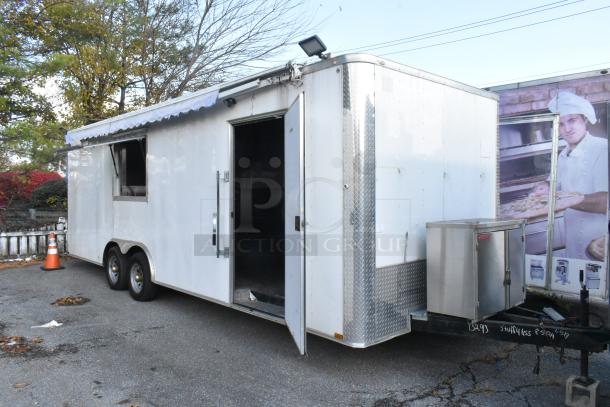 Brand new unbranded food trailer, equipped with Coleman's Mack Ventilation, wire shelving, ready for customization.