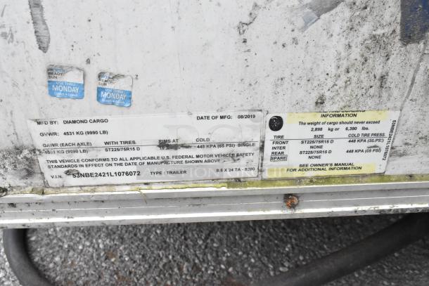 Label details on a Diamond Cargo food trailer manufactured in 08/2019. GVWR 4531 kg. VIN: 5NBE2421L1076072.