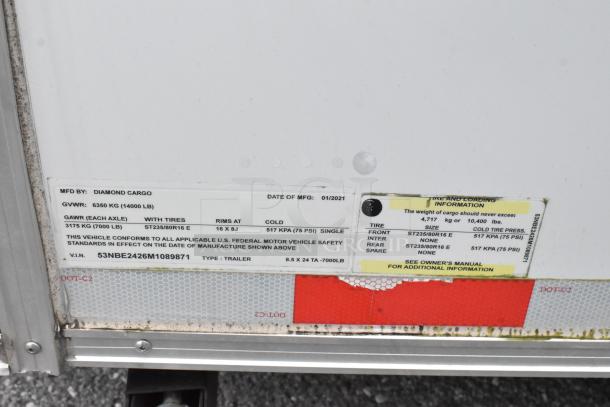 24' Diamond Cargo trailer label showing GVWR 14000 lbs and GAWR 7000 lbs. VIN: 53NBE2426M1089871. Manufactured 01/2021.