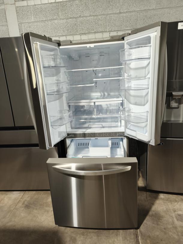 LG 3-Door French Door Refrigerator, 21.8 cu ft, Model LFDS22520S/06, like new, with external water dispenser.