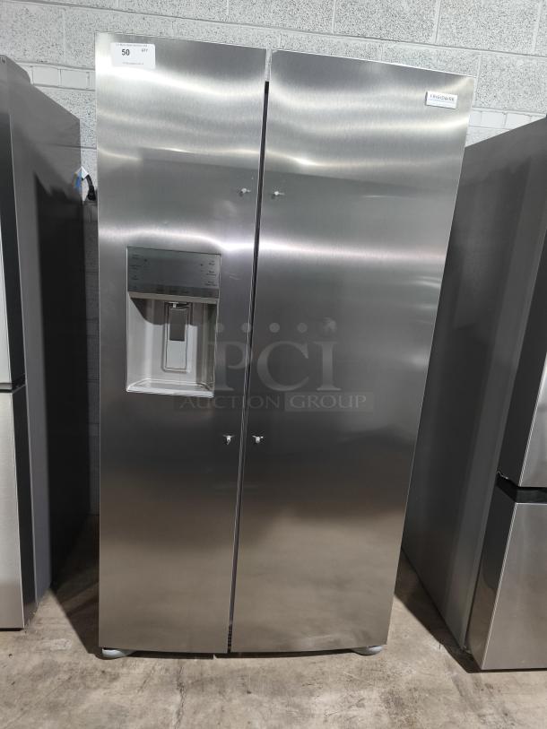 Frigidaire Gallery 25.6 cu ft side-by-side refrigerator, model GRSS2652AF, new, stainless steel, with water dispenser.
