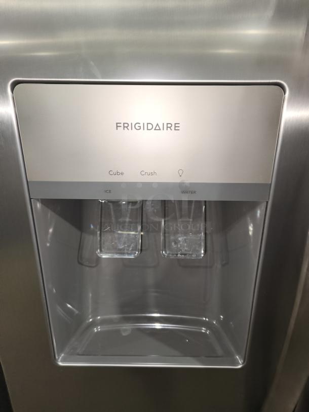Frigidaire FRSS26L3AFE 25.6 cu ft side-by-side fridge, stainless steel, ice and water dispenser, like new condition.
