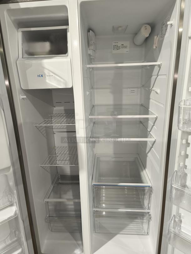 Frigidaire FRSS26L3AFE 25.6 cu ft side-by-side refrigerator, like new condition, features spacious interior, ice maker, adjustable shelves.