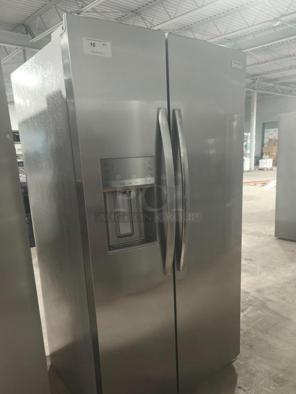 Frigidaire Gallery 25.6 cu ft side-by-side refrigerator, model GRSS2652AFA, stainless steel, new condition, with dispenser.