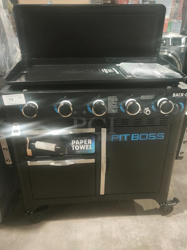 Pit Boss PB5BGD2 gas griddle, brand new, 5 burners, lift-off griddle top, cabinet with paper towel dispenser, black finish.