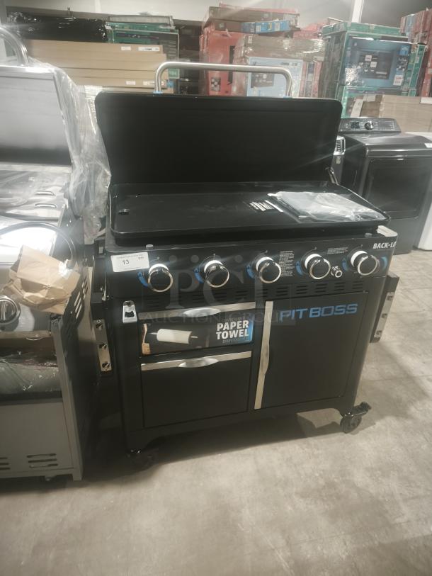 Brand new Pit Boss PB5BGD2 Ultimate Lift-Off 5 Burner Gas Griddle with cabinet. Includes convenient paper towel holder.