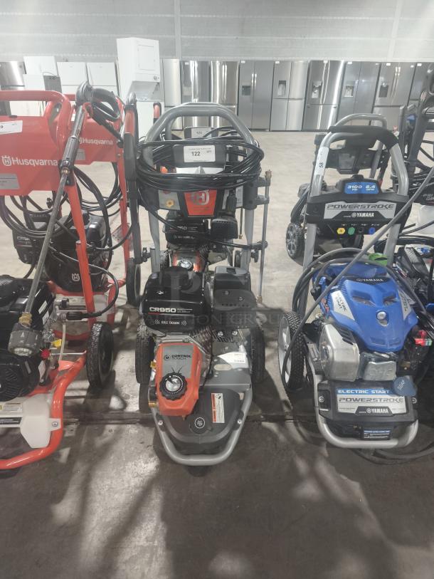 Husqvarna PW-3200 gas pressure washer, model 022007, 3200 PSI. Heavy-duty, tested, working condition, visible hoses and controls.