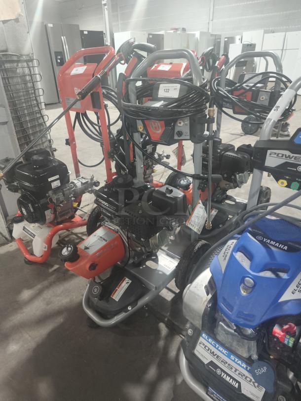 Husqvarna PW-3200 gas pressure washer, model 022007, 3200 PSI, heavy-duty, tested and working. Serial tag visible.