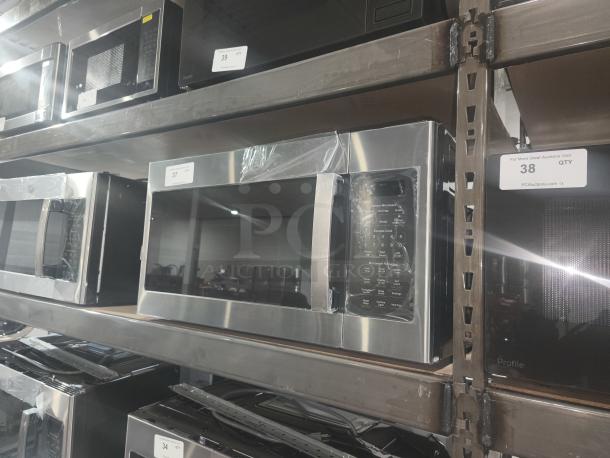 BRAND NEW SCRATCH AND DENT - GE 1.7 cu ft Over-the-Range Sensor Microwave Oven, Model JVM6175SK6SS, stainless steel finish, minor cosmetic imperfections but unused, control panel visible.