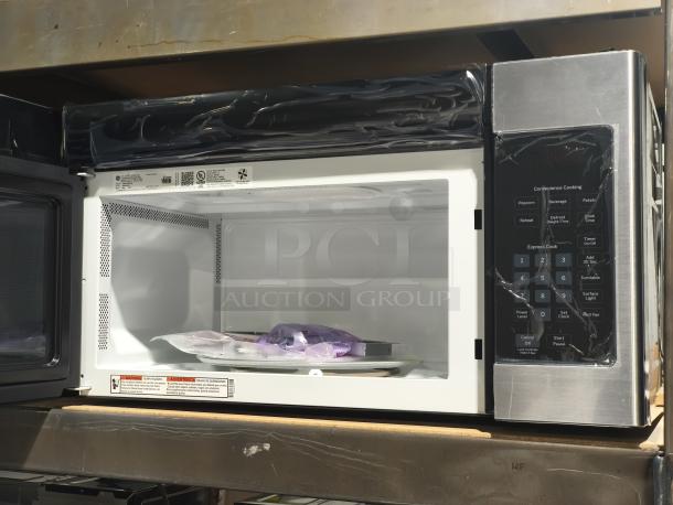 BRAND NEW SCRATCH AND DENT - GE 1.6 cu ft Over-the-Range Microwave Oven, Model PVM9005SJ8SS, stainless steel, black control panel.