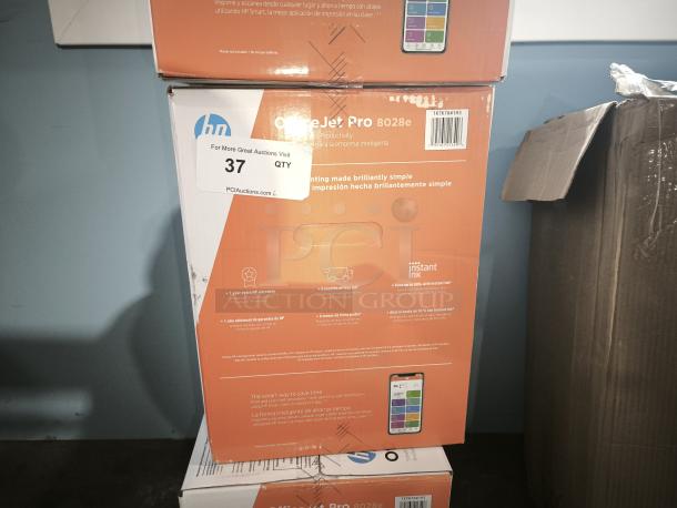 Brand new HP OfficeJet Pro 8028e printer box. Features wireless printing, Instant Ink eligibility. Model visible on packaging.