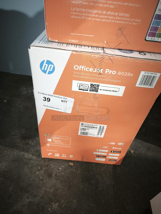 Brand new HP OfficeJet Pro 8028e All-in-One printer in box; wireless, color inkjet; model details and labels visible.