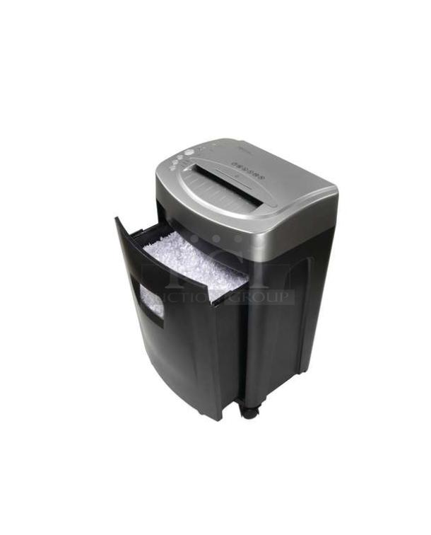 "Brand new Royal MC14MX micro-cut shredder, 14-sheet capacity, sleek black and silver design, visible open bin with shredded paper."