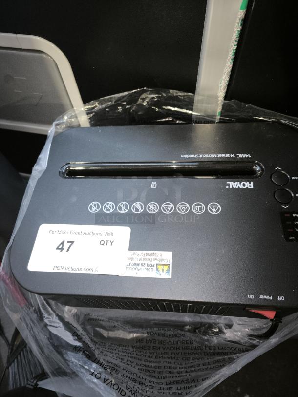 Brand new Royal MC14MX 14-Sheet Micro-Cut Shredder in original packaging. Model 14MC. Auction tag visible.