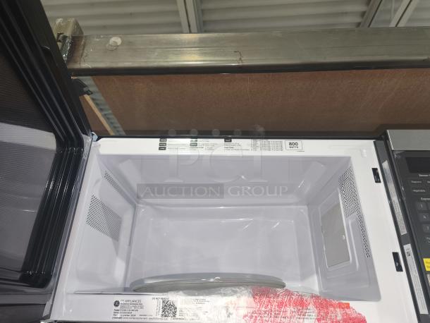 BRAND NEW GE Profile™ 1.1 cu. ft. countertop microwave, model PCHK11S1WSS, with sensor cooking; interior view showing 800 watts label.