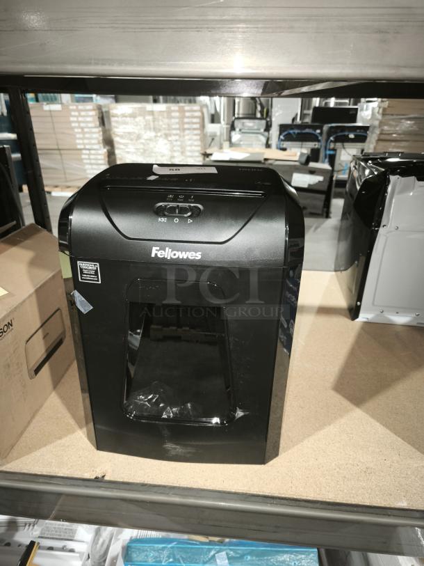 Fellowes Powershred 1200C Cross-Cut Shredder, brand new, compact black design, powerful shredding capability, visible controls.