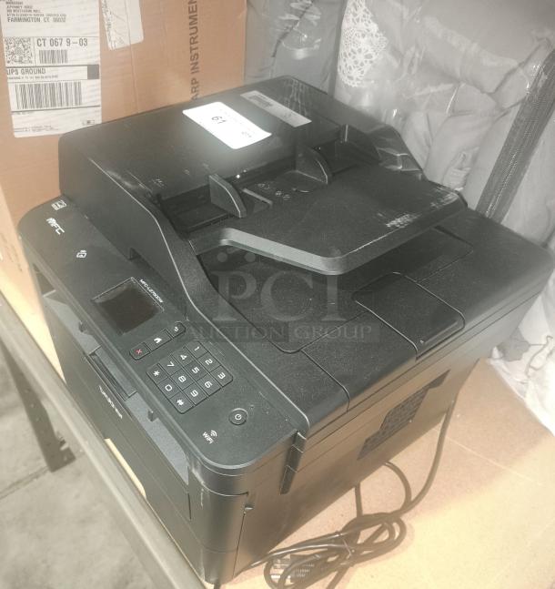 Brother MFC-L2760DW all-in-one laser printer, new, with copy, scan, fax, duplex, mobile printing. Wireless connectivity.