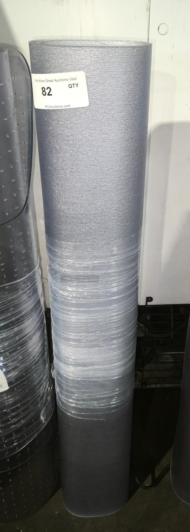 EverLife clear chair mat, brand new, for hard floors, 46"x60". Features protective surface and rolled-up storage.