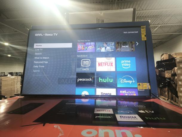 ONN 50” 4K UHD LED Roku Smart TV (Model 100012585) in original packaging, featuring HDR and pre-loaded streaming apps.