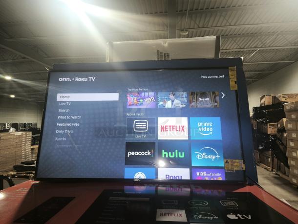 ONN 50" 4K UHD LED Roku Smart TV, Model 100012585, showing streaming apps. New condition, energy guide label visible.