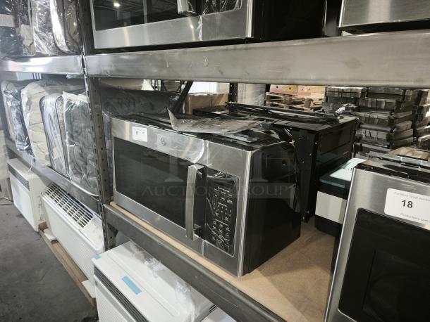 Brand new GE 1.7 cu ft Over-the-Range Sensor Microwave Oven, model JVM6175SK6SS, with visible scratch and dent condition.