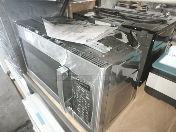 BRAND NEW GE 1.7 cu ft Over-the-Range Sensor Microwave Oven, Model JVM6175SK6SS, scratch and dent condition, with installation manual.
