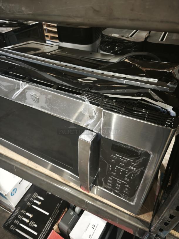 BRAND NEW GE 1.7 cu ft Over-the-Range Sensor Microwave Oven, Model JVM6175SK6SS, Scratch and Dent. Stainless steel, control panel visible.