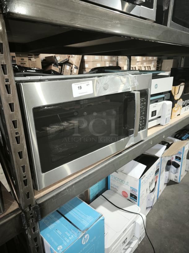 Brand new GE over-the-range microwave oven, model JVM6175SK6SS, 1.7 cu ft, scratch, and dent condition.