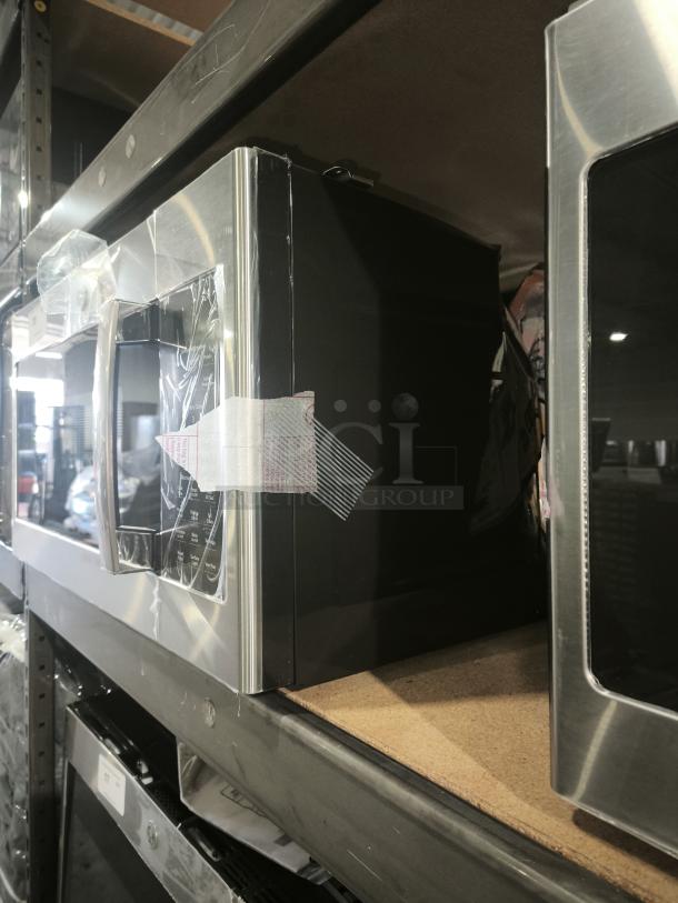 GE 1.7 cu ft over-the-range microwave, model JVM6175SK6SS. Brand new, minor scratch and dent, stainless steel finish.