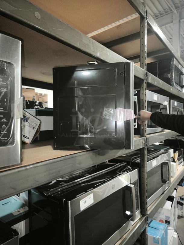 BRAND NEW GE 1.7 cu ft Over-the-Range Sensor Microwave, Model JVM6175SK6SS, with minor scratches and dents.