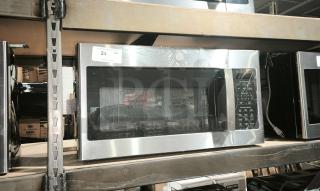 GE 1.7 cu ft Over-the-Range Sensor Microwave, model JVM6175SK6SS, brand new with minor dents. Silver finish.