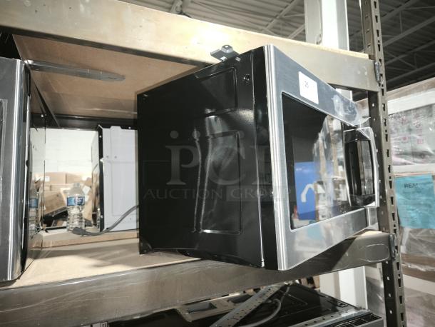 BRAND NEW GE 1.6 cu ft Over-the-Range Microwave Oven, model JVM6175SK6SS, scratch and dent, black finish.