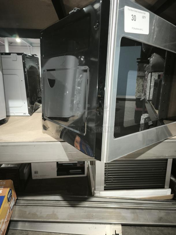 BRAND NEW GE 1.7 cu ft Over-the-Range Sensor Microwave Oven, model JVM6175SK6SS, with scratch and dent marks, in original packaging.