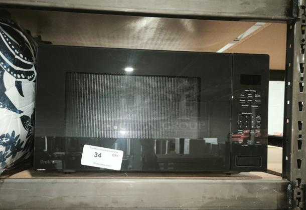 BRAND NEW SCRATCH AND DENT GE Profile 2.2 cu ft built-in sensor microwave oven, model PCWK22U1WDD. Visible control panel.