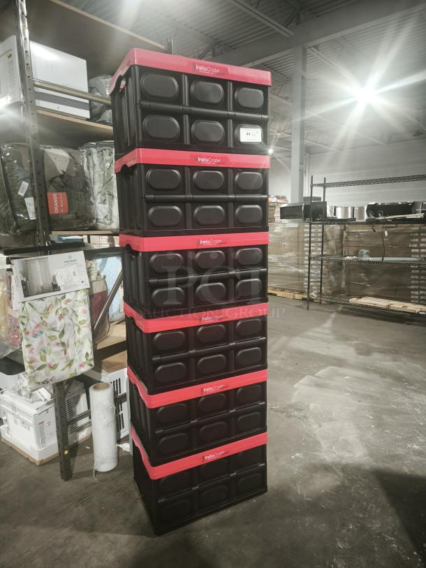 Stack of brand new Greenmade InstaCrate 12-Gal collapsible storage containers, model 1959031, with red accents.