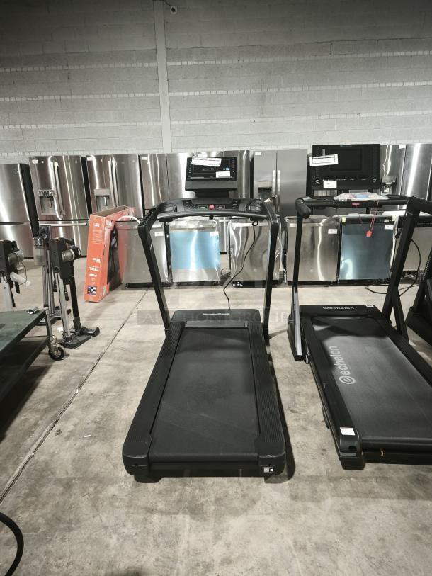 Brand new French Fitness T600 treadmill with 7" blue LCD screen, model FF-T600, shown in auction setting.