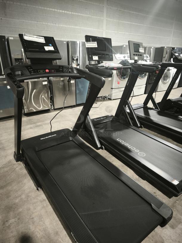 French Fitness T600 treadmill, brand new, 7" blue LCD screen, sleek design, ideal for home workouts. Model FF-T600.