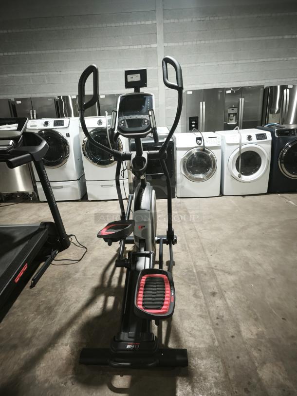 ProForm CoachLink E9.0 Elliptical, model PFEL59718, brand new, with digital console and ergonomic handles.