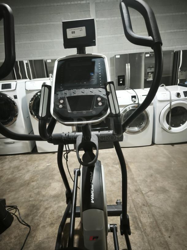 ProForm CoachLink E9.0 Elliptical, Model PFEL59718, brand new, digital display, ergonomic handles, ProForm logo visible.